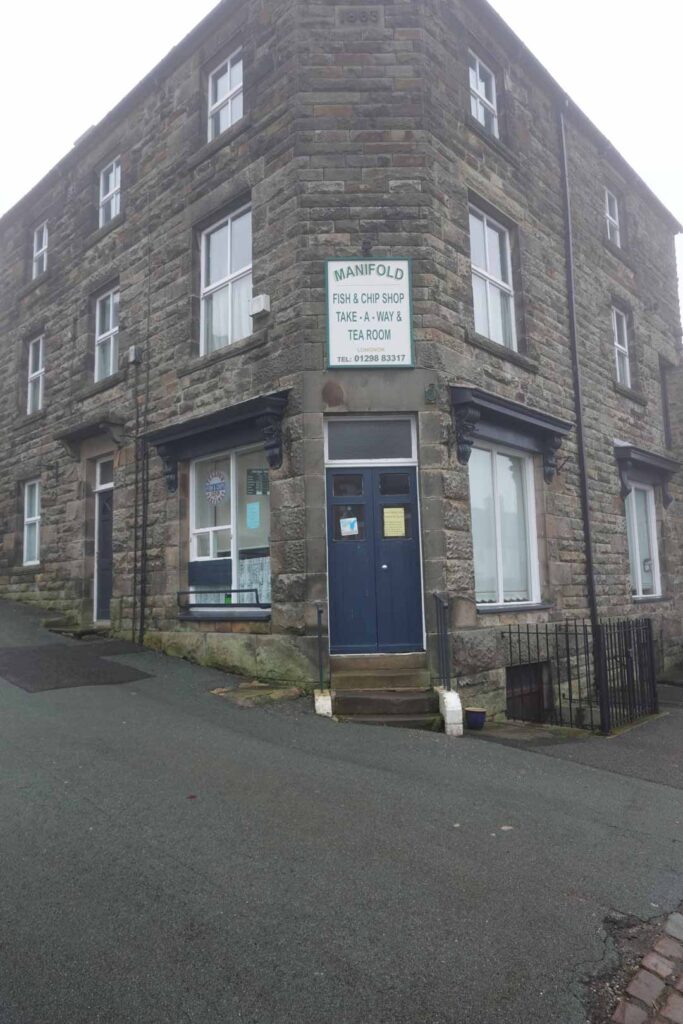 Exterior of the Manifold Fish and Chip Shop in Longnor, housed in a traditional stone building.